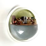 sculpture in glass case