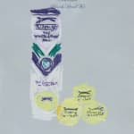 sketch of tennis balls next to packaging tube on hotel stationary