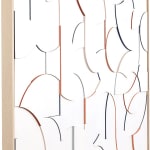 side view of abstracted typography design in white wood with colorful accents on the side of wood