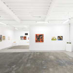 Installation view of four framed paintings by artist Kirsten Sims in a grid configuration