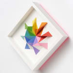wooden geometric wall sculpture by Sean newport - rainbow