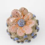 Jen Dwyer sculpture - round tan plant with blue dots all over and pink flower on top