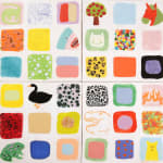 ceramic tiles with nine squares, each containing either a pattern, an animal, or organic shape by Lorien Stern