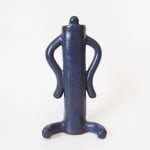 ceramic piece by Jocelyn Tsaih of a tall deep purple figure sitting