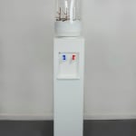 Paul Gagner Scultpure of a ship frozen in an Office water cooler