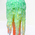 Dan Lam slime sculpture with gradient of green, red, and blue