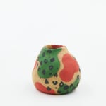 Jackie Brown small ceramic pinch put with green and pink pattern painted on as well as leopard print