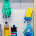 detail image of gloves and cleaning sprays