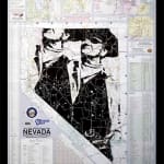 Cut up Nevada paper map with silhouette of two men drawn on it