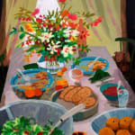 Dining table with an assortment of dishes like salad and bread as well as a large bouquet of flowers