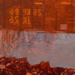 Painting of a freight train. Puddles of water reflect the train in the water and trees in the background are bare from winter.