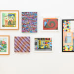 various paintings hanging on the walls at Friends & Family