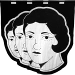 embroidered black and white banner of the heads of three woman in an angled row