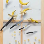 painting of dog banana creature falling in mid hair with suspended knives cutting through them
