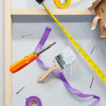 detail of paint brush and screwdriver
