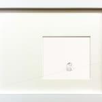 framed drawing of a figure sitting under a line
