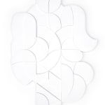 all white wooden relief piece featuring many smaller pieces