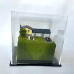 sculpture in glass case