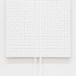Didi Rojas woven painting of clean lace weave checkered, one bow on top middle
