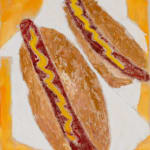 two hot dogs on a pile of napkins