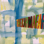 Painting with large green, yellow and blue brush stroke throughout the background with the words "THE KARMA FARMER" in large letter in various colors in the center