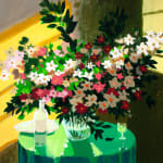 white and pink flowers on a green table with bright yellow sunlight
