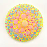 Circular sculpture by Dan Lam with multicolor circles and tiny bright yellow spikes.