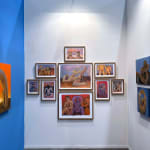 installation view of Carlos Rodriguez framed paintings on paper in a cluster