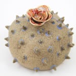 Jen Dwyer sculpture - round brown spiky plant with flower on top