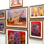 installation view of Carlos Rodriguez framed paintings on paper in a cluster