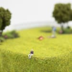 miniature of a person burying a body