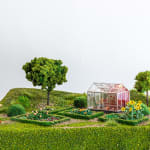 miniature diorama by Abigail Goldman of a person gardening and a dead body in their green house