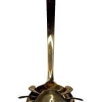Sculpture of a brass crab with an underwater scene inside of the crab shell