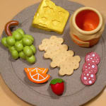 marinatedclouds sculpture of a plate of charcuterie