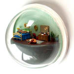 sculpture in glass case