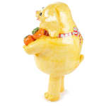Katie Kimmel's ceramic sculpture of a dog holding fruit in a red checkered apron