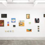 Installation view of a gallery wall with various artworks installed in a salon-style at Hashimoto Contemporary San Francisco