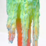 Dan Lam slime sculpture with gradient of green, red, and blue