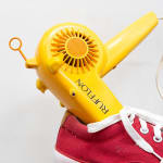 detail image of shoe and hairdryer
