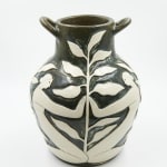Hilda Palafox black vase sculpture with white women holding white leaves