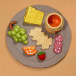 marinatedclouds sculpture of a plate of charcuterie