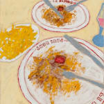 three plates of food and partially obscured glass of wine