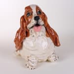 Katie Kimmel - ceramic sculpture of a brown and white basset hound, its body is rounded like a balloon