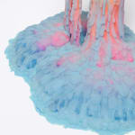 Dan Lam slime sculpture with gradient of green, red, and blue