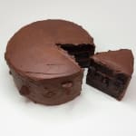 Stephen Morrison sculture of chocolate cake with dog face and slice of cake with dog face