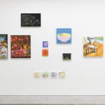 Installation view of a gallery wall with various artworks installed in a salon-style at Hashimoto Contemporary San Francisco