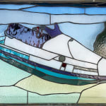 Pat Perry and Rosemary Brown collaborative stainglass piece of a water ski