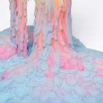 Dan Lam slime sculpture with gradient of green, red, and blue