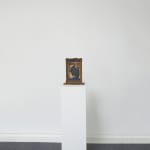 Untitled (Suited Man Holding Key), installed