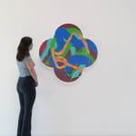 Wide installation view of Guardian Angel with woman to the left of the piece to show scale